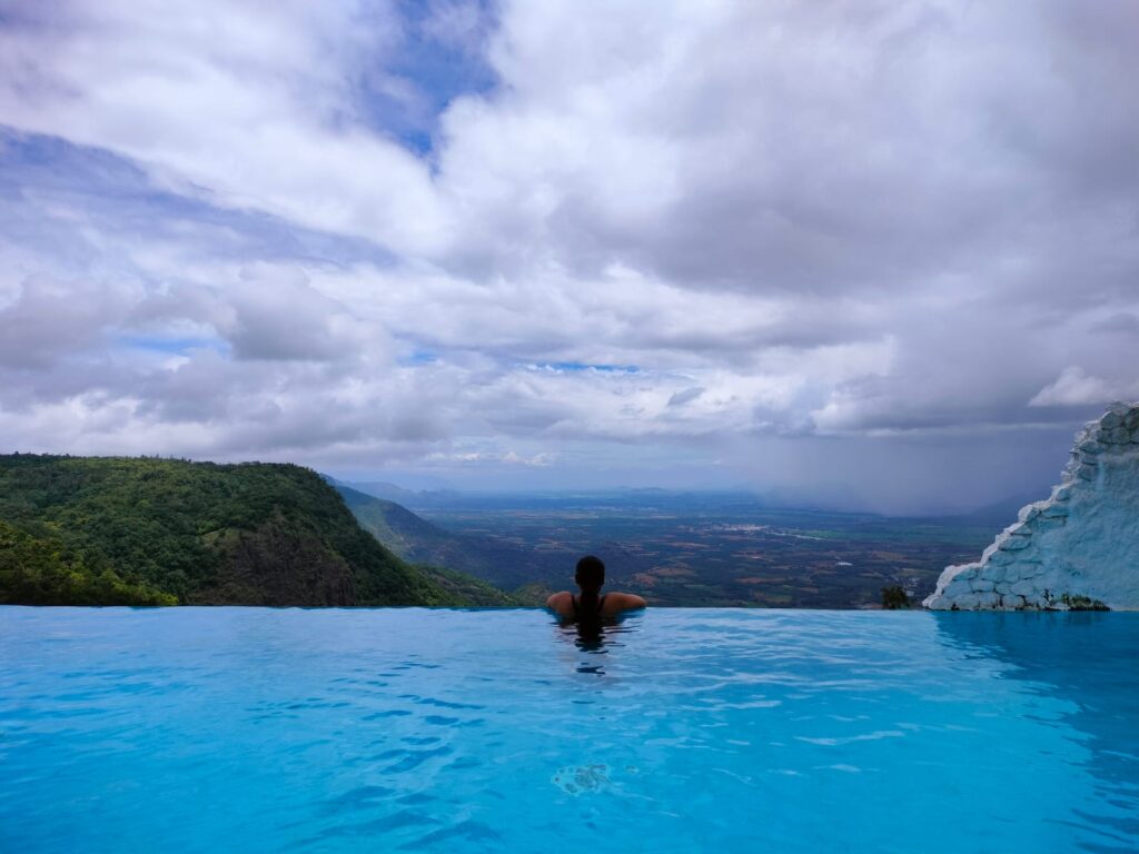 view from infinity pool at Hills and hues resort, thekkady